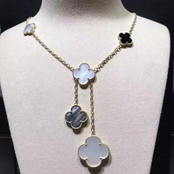 Van Cleef & Arpels Magic Alhambra necklace, 6 motifs, yellow gold, white and gray mother-of-pearl, onyx.