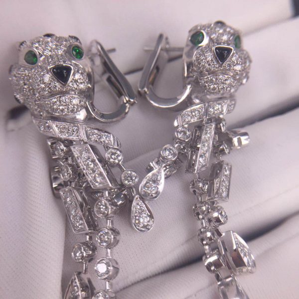 Panthère de Cartier Earrings, 950‰ platinum, 310 brilliant-cut diamonds totaling 5.63 carats, emeralds, onyx.