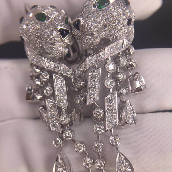 Panthère de Cartier Earrings, 950‰ platinum, 310 brilliant-cut diamonds totaling 5.63 carats, emeralds, onyx.