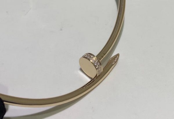 Cartier Juste un Clou necklace, real 18K pink gold, set with 65 brilliant-cut diamonds totaling 0.67 carats.